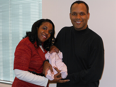 New Adoptive Parents with Baby